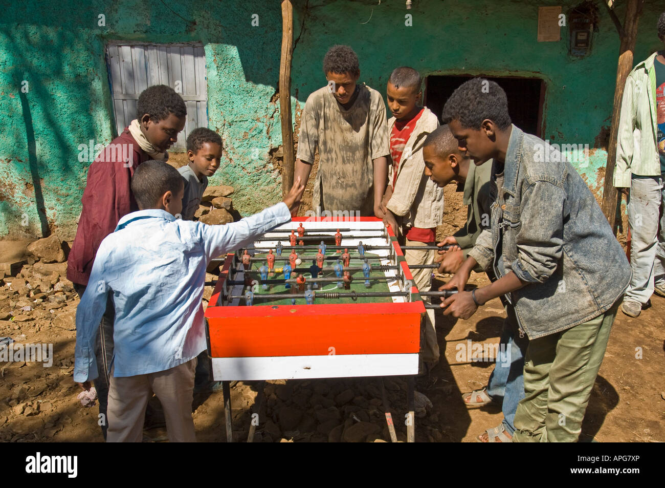 A very popular pastime for Ethiopian children is to play foosball or table football on the streets of Gondar. Stock Photo