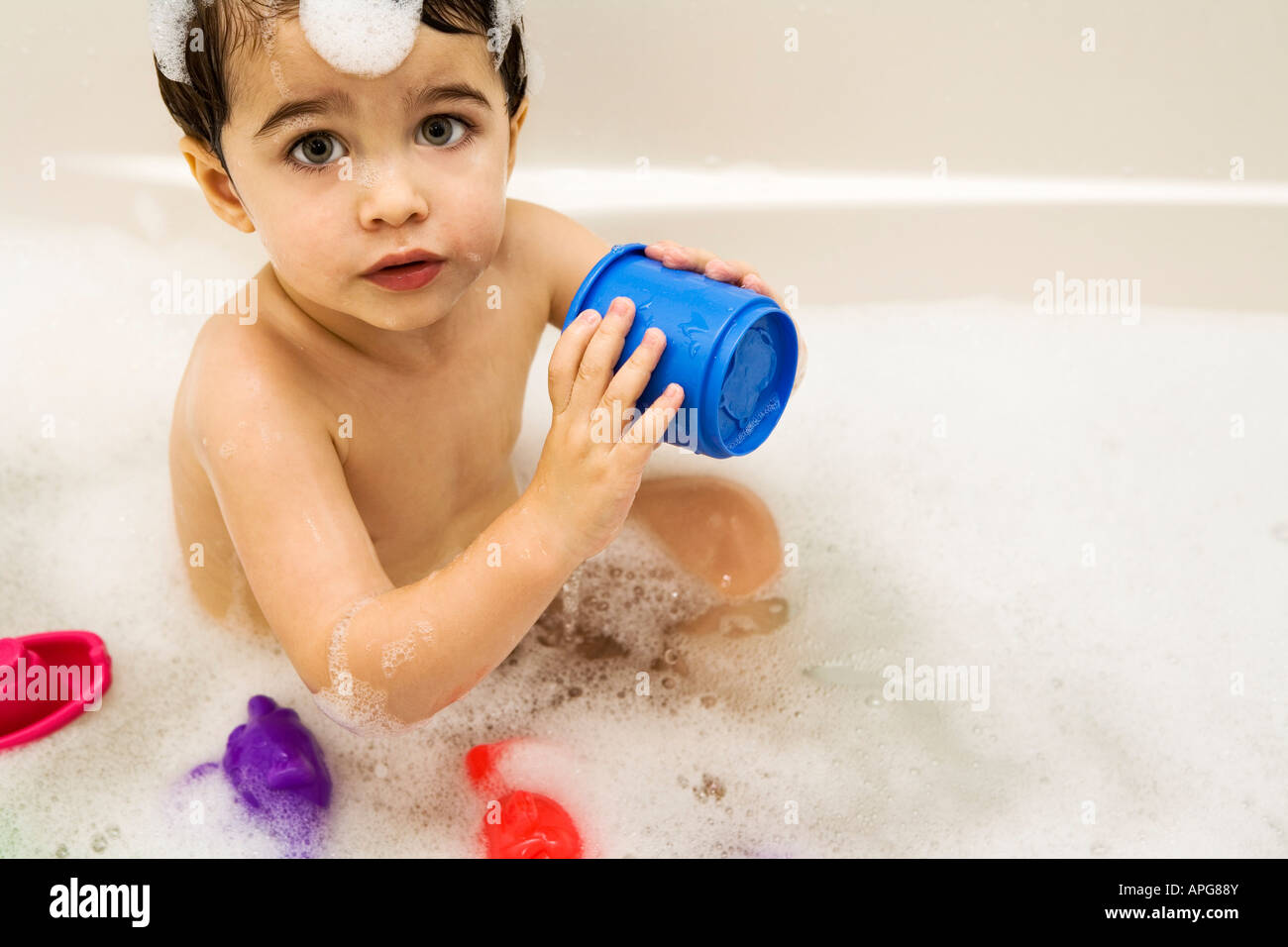 Baby in a bubble bath Stock Photo Alamy