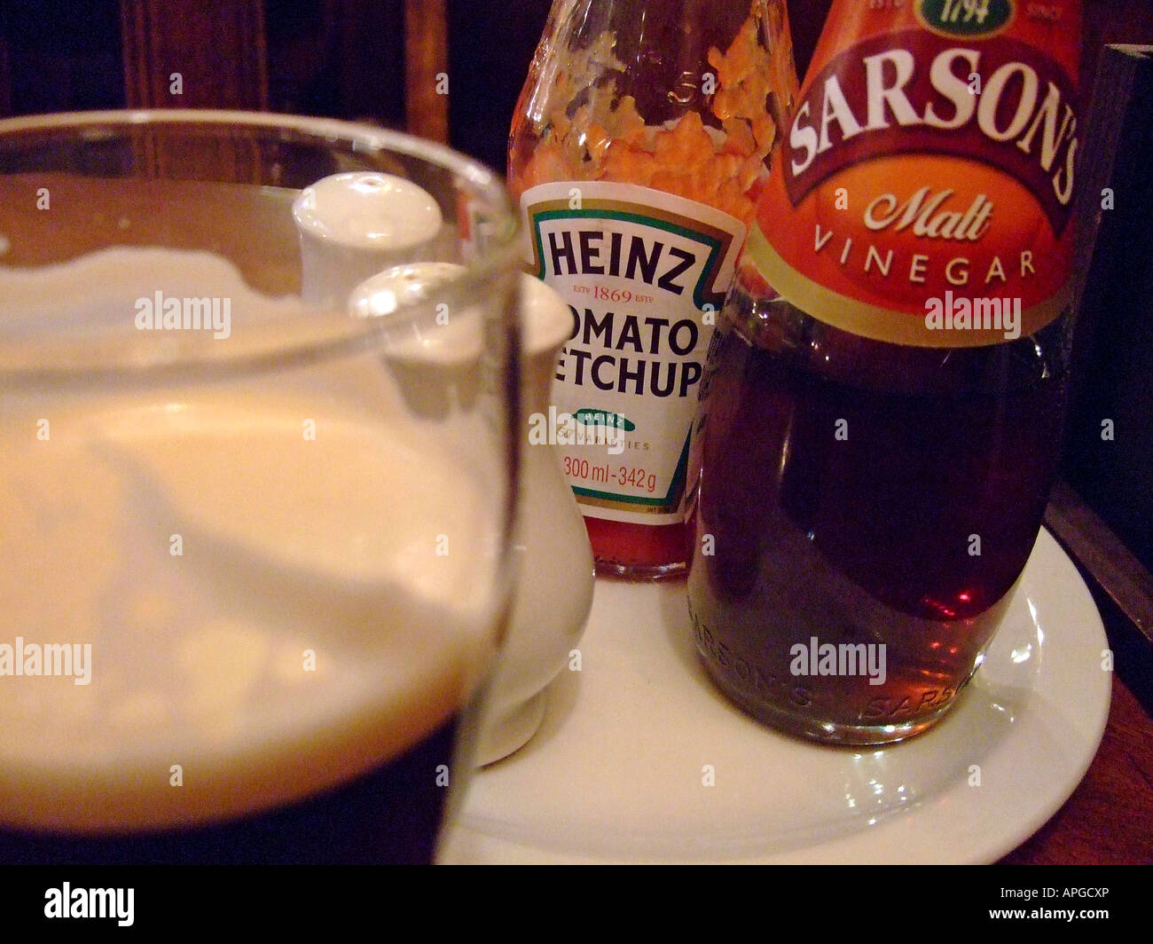 "Guinness stout salt pepper ketchup vinegar" Stock Photo