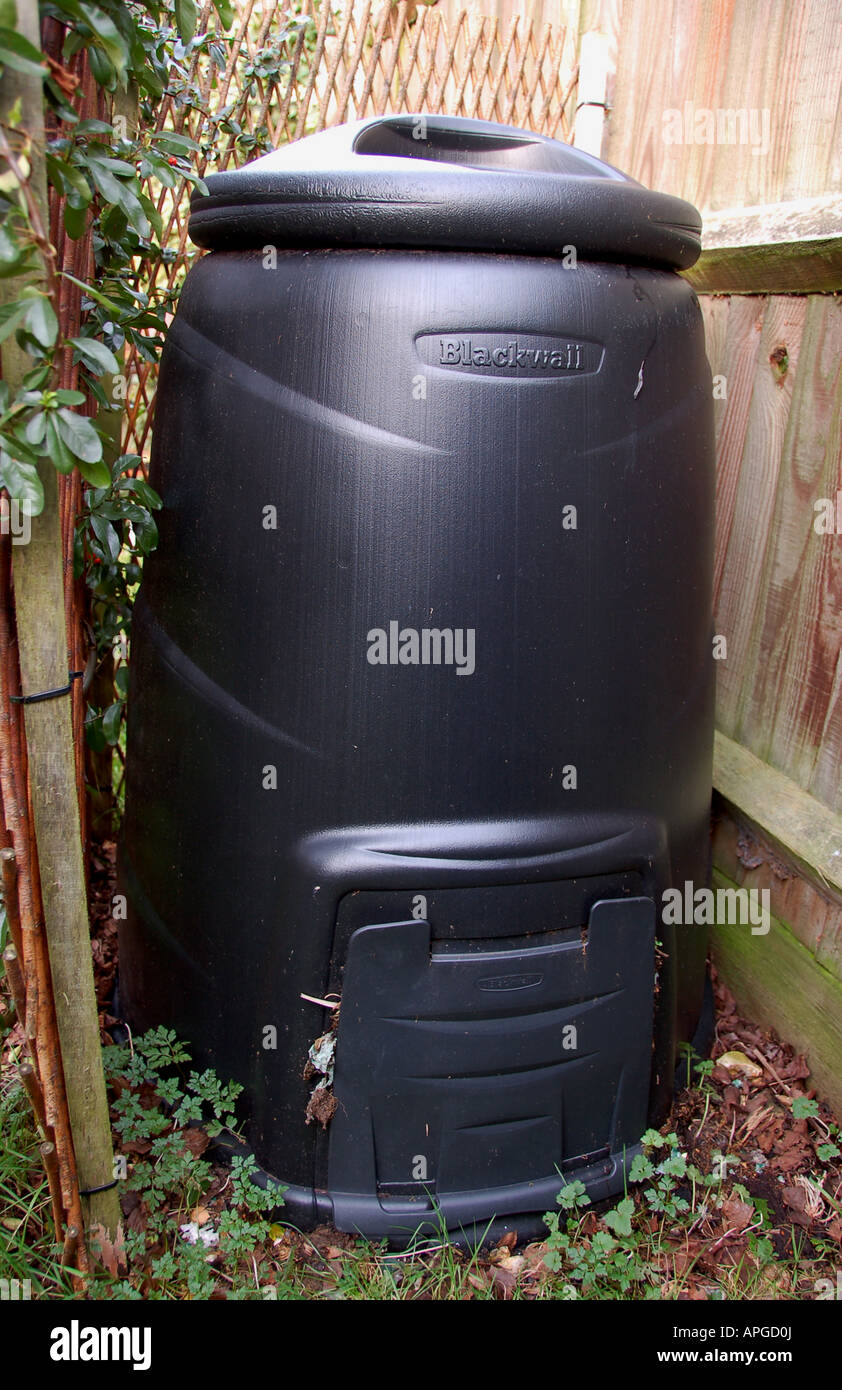Black plastic compost bin in a garden Stock Photo Alamy