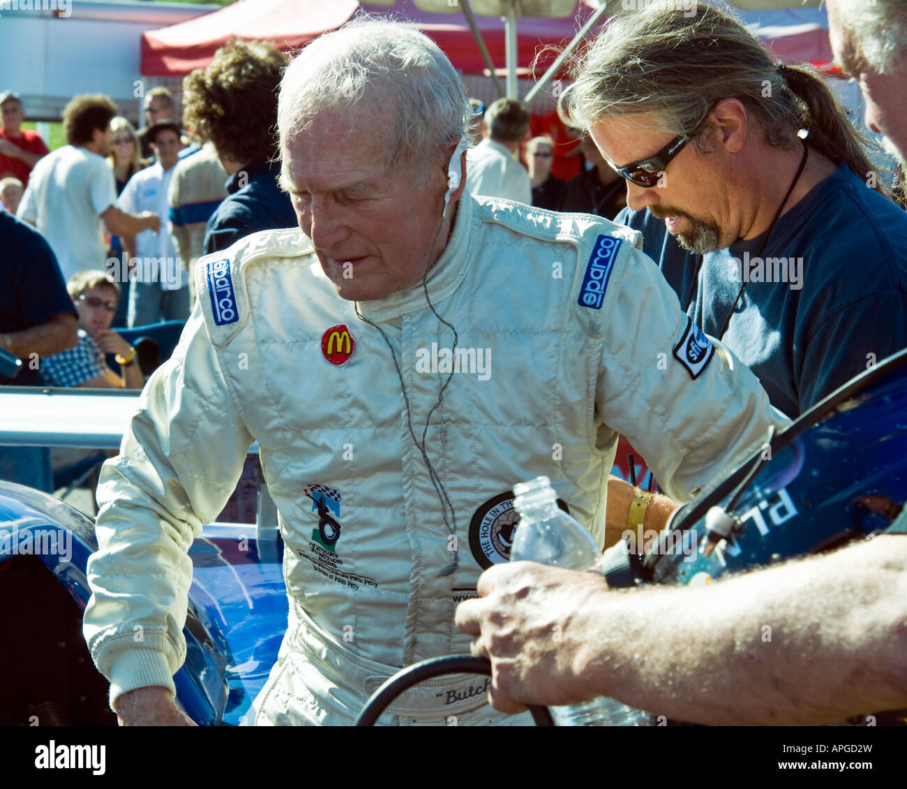 Paul Newman age 82 climbs out of racecar after winning at Lime Rock