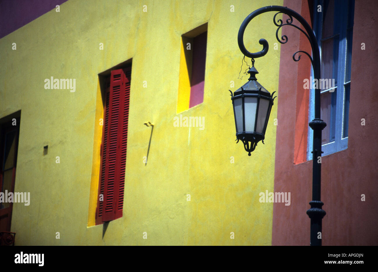 A street lamp and colorful walls in La Boca, Buenos Aires, Argentina Stock Photo
