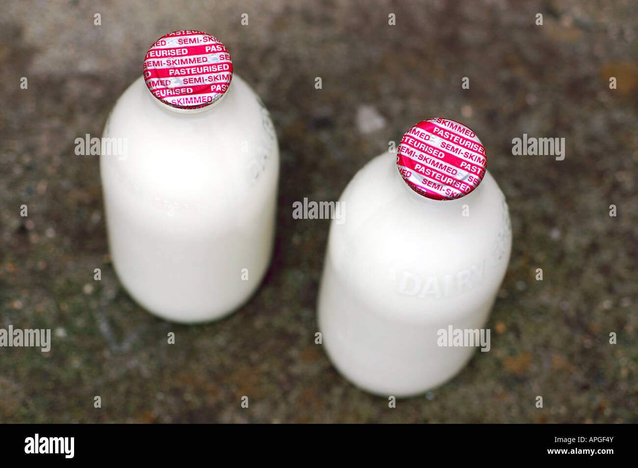 One pint bottles of milk delivered to a doorstep, UK Stock Photo