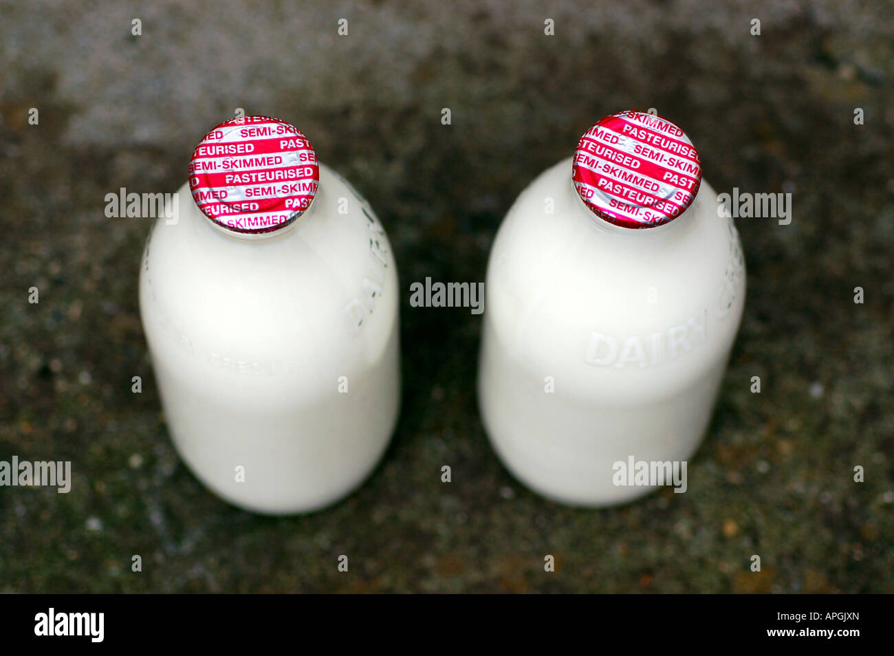One pint bottles of milk delivered to a doorstep, UK Stock Photo