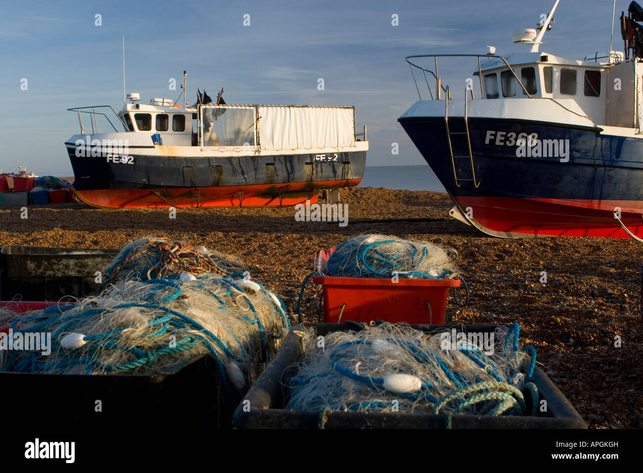Fishing boats beached at Dungeness, Kent, England Stock Photo - Alamy