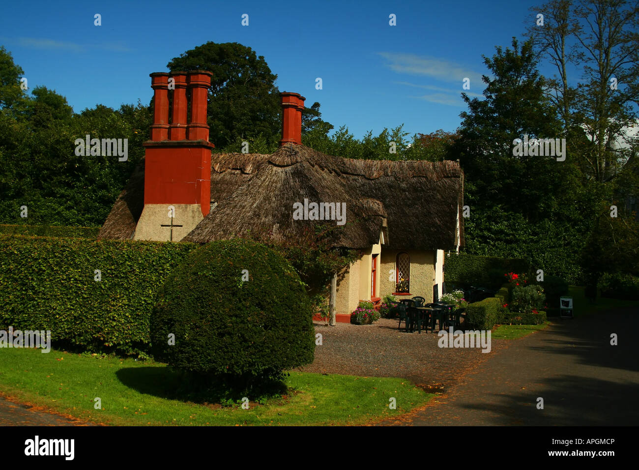 traditional irish thatched roof cottage in Killarney, County Kerry