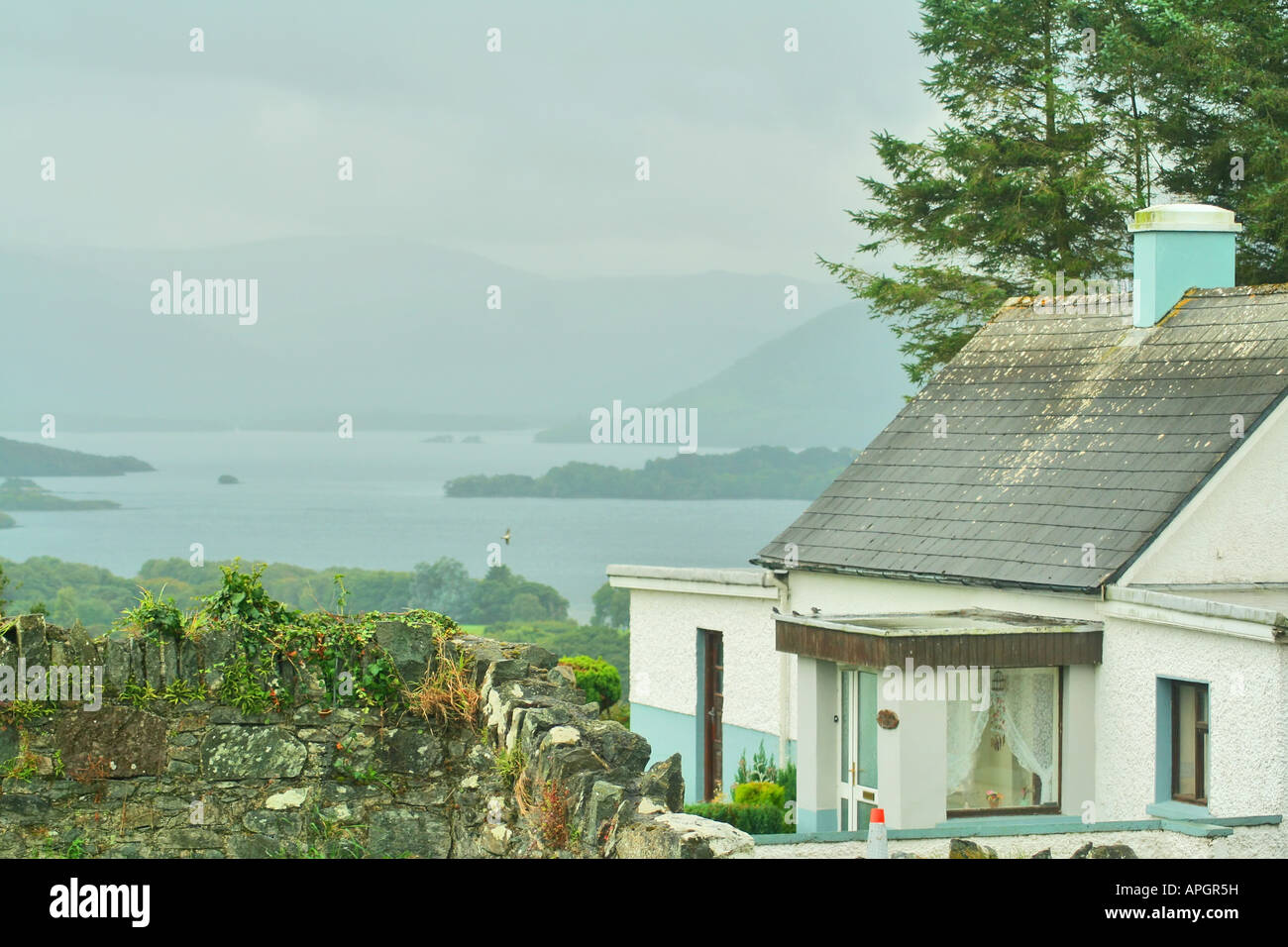Quaint Irish Lake Front Cottage In Killarney Ireland Stock Photo