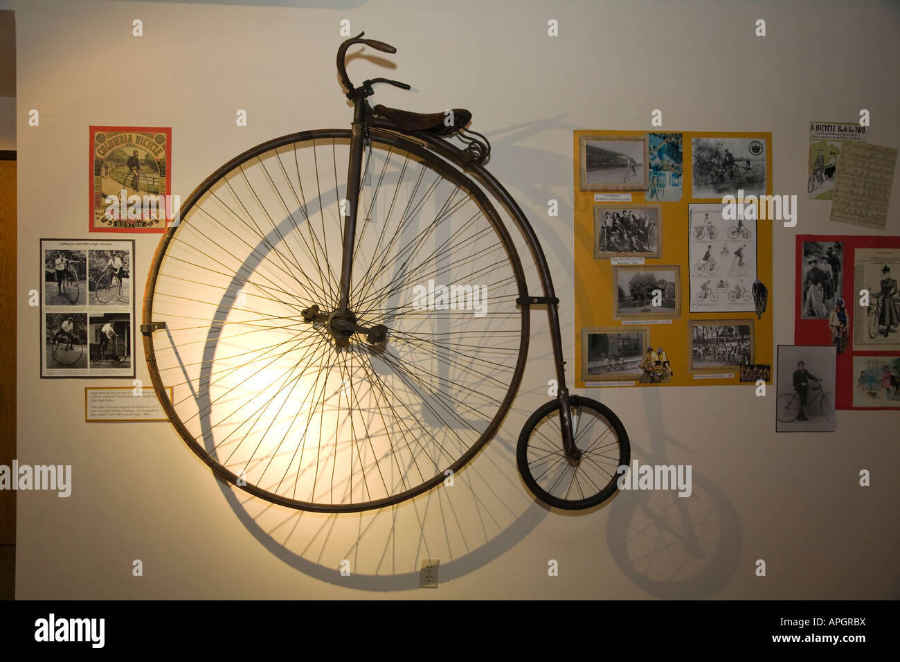 ILLINOIS Rockford Old fashioned bicycle with large front wheel hanging in display Midway Village museum center Stock Photo Alamy