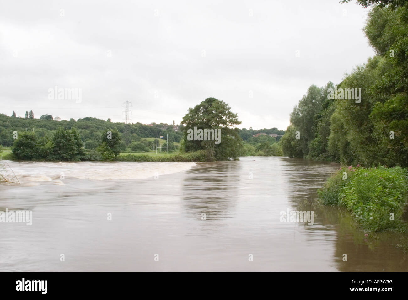 The River Aire in flood at Kirkstall Abbey Leeds West Yorkshire June 2007 Stock Photo