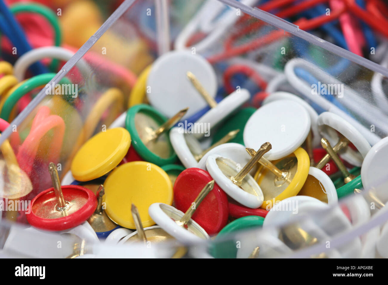 colourful drawing pins and paper clips in a pot Stock Photo Alamy