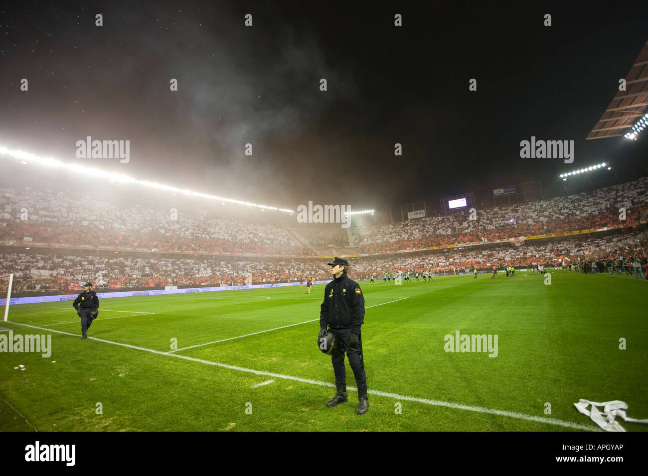 Spectators Riots Riot policemen watching the spectators Stock Photo - Alamy