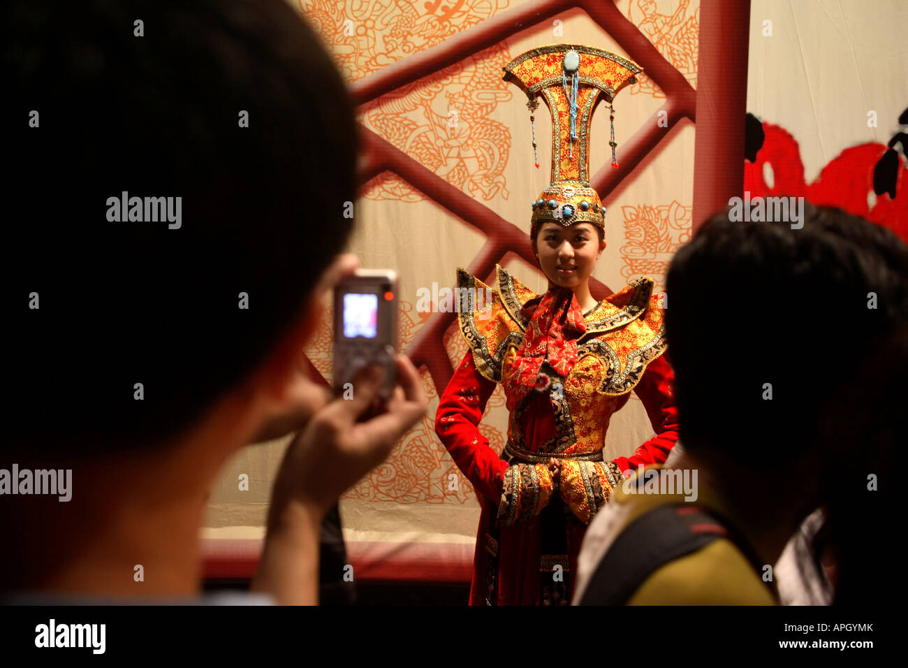 A girl poses in Traditional costume during the Hong Kong Lantern