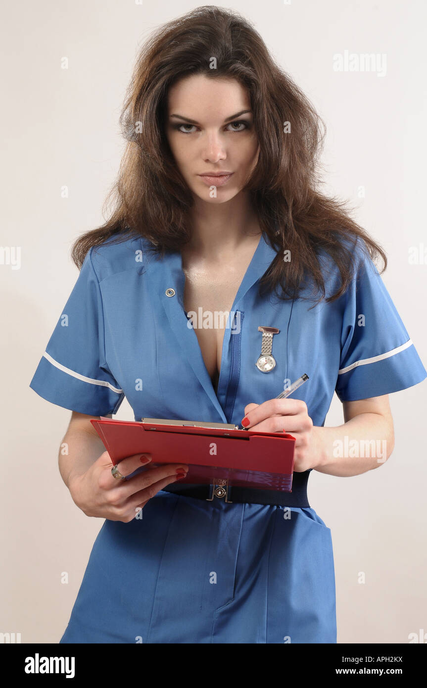Sexy nurse holding a clipboard Stock Photo