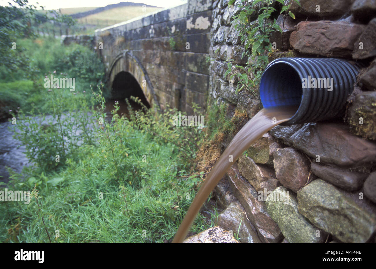 Road water run off into Eden River SSSI during heavy rain Nr Melmerby Cumbria Engalnd Stock Photo