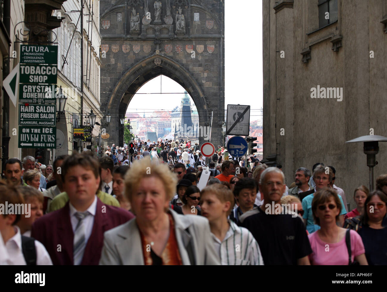 Bustling crowd in front of the entrance to Charles Bridge, Prague Stock Photo