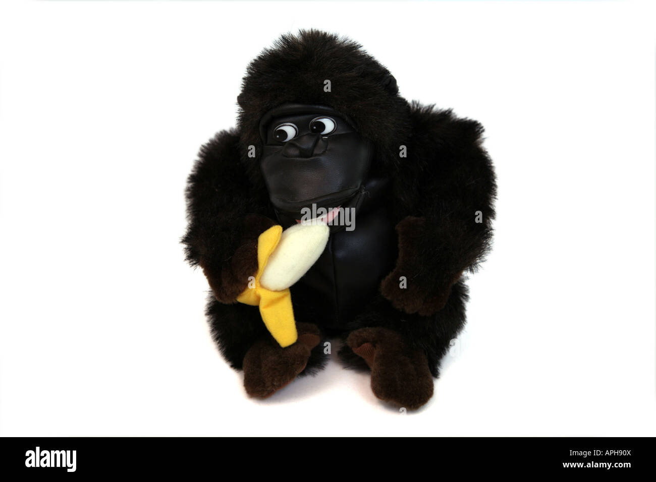 Gorilla Eating Banana Stock Photo