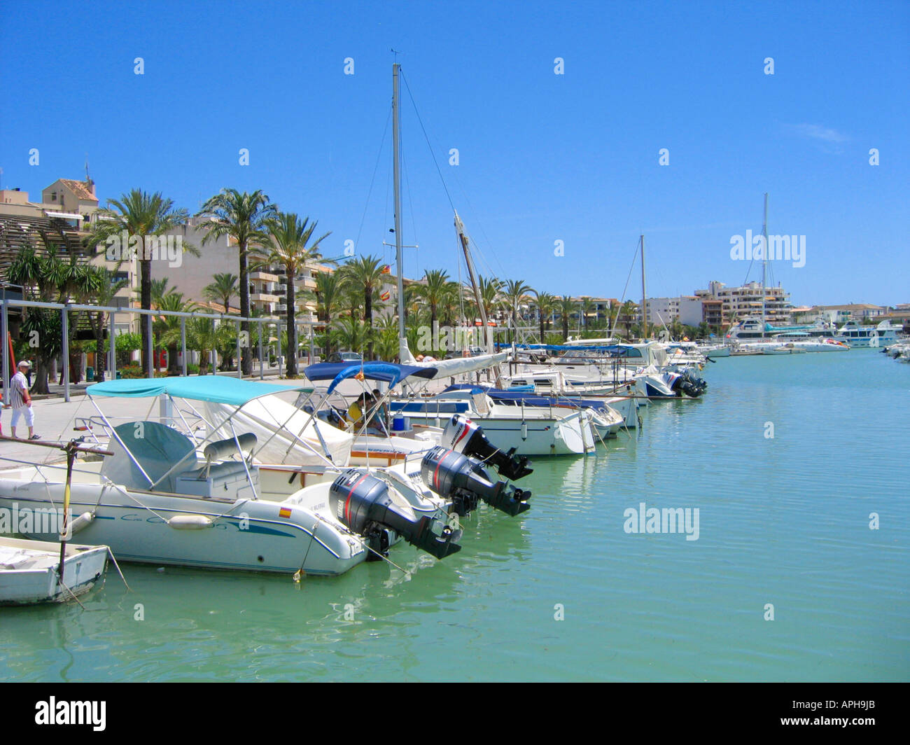 Luxurious boats fill the yacht harbour Puerto de Alcudia in Alcudia on ...