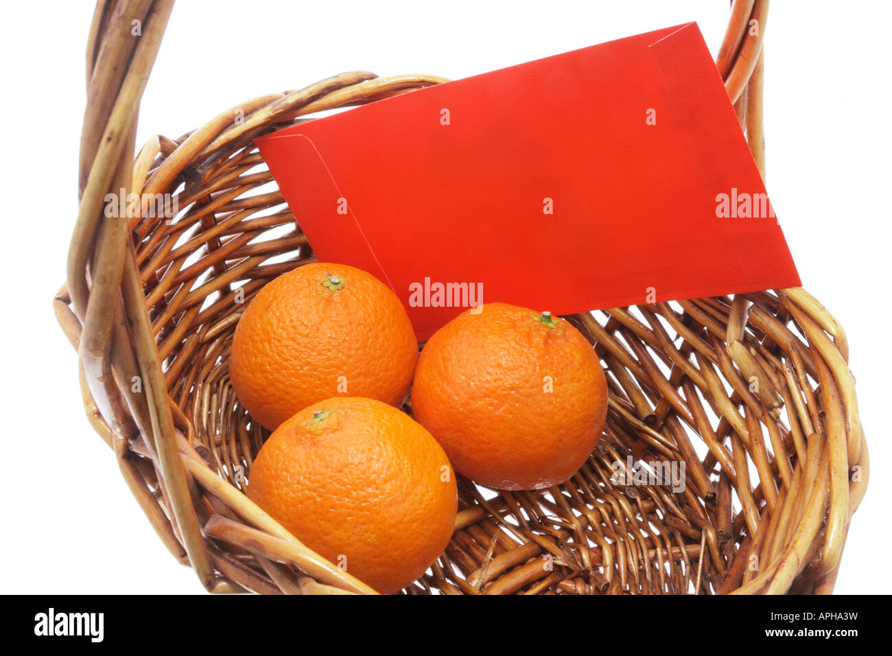 Mandarins and Red Packet in Basket Stock Photo Alamy