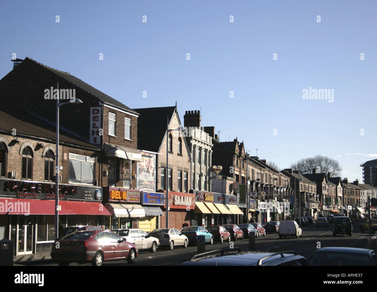 The popular Curry Mile in Wilmslow Road Rusholme near Manchester UK