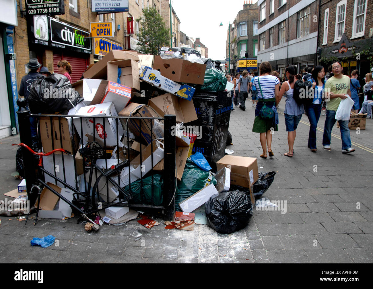 large pile of rubbish and shop packing boxes in Brick Lane east London