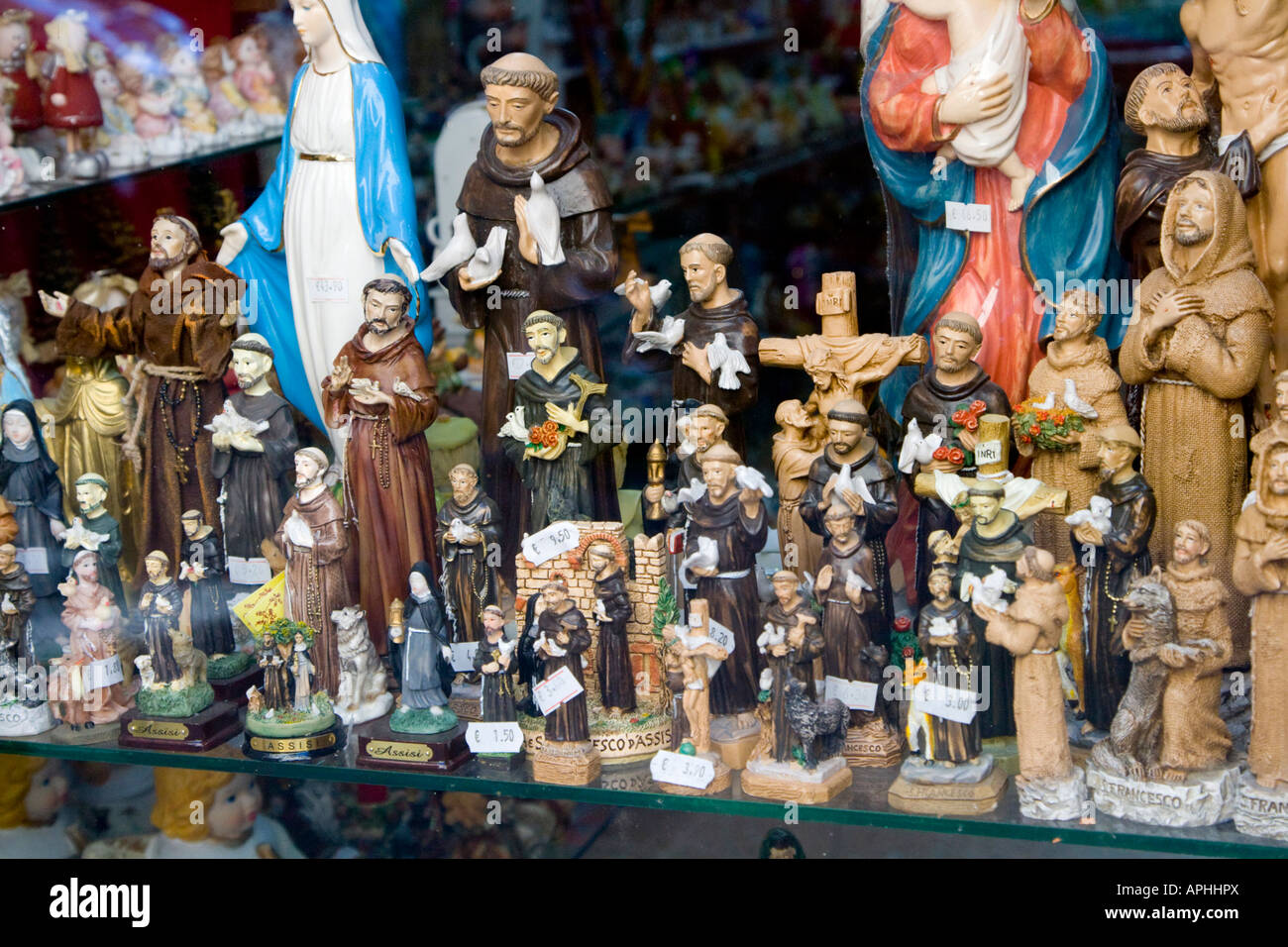 Religious souvenirs in shop window in Assisi Italy Stock Photo Alamy