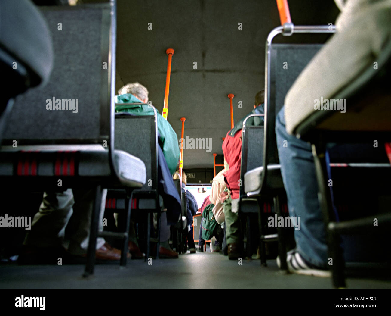 people travelling on a bus with a low viewpoint in cornwall Stock Photo