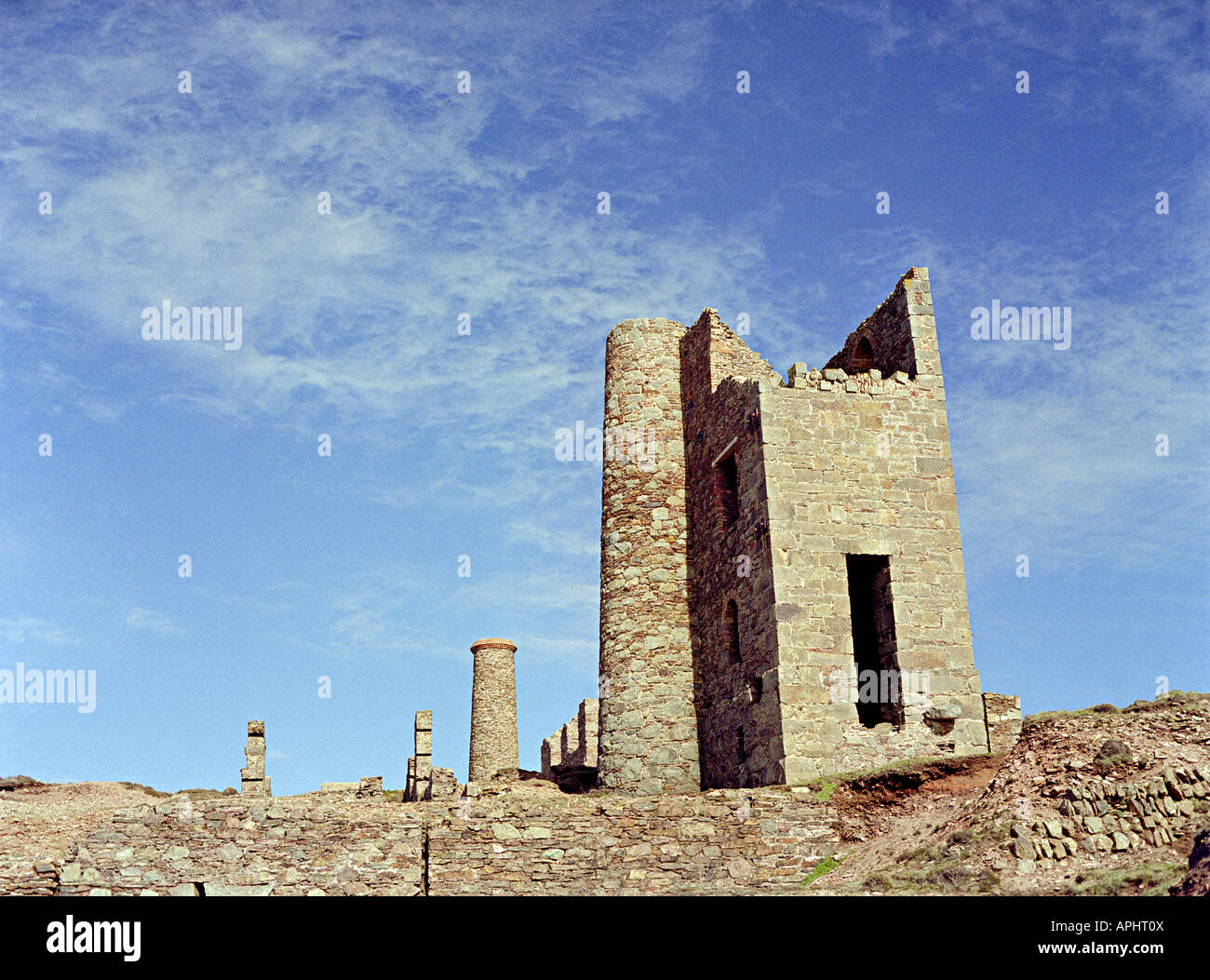 remnants of tin mines pumping stations on the south coast of cornwall near porthcorno Stock Photo