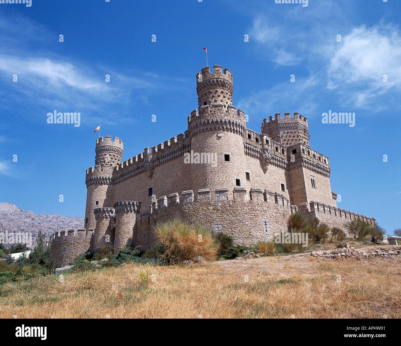 Exterior of restored 15th century castle at Manzanares El Real situated on the southern approaches to the Sierra de Guadarrama Stock Photo