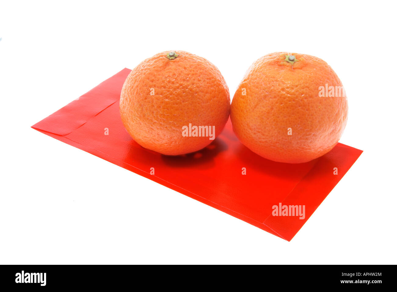 Mandarins and Red Packet Stock Photo Alamy