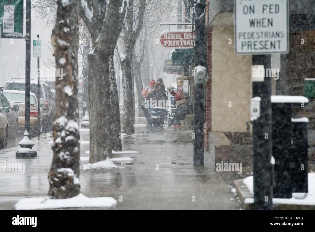 Sidewalk scene in historic Littleton Colorado on Littleton Blvd in a