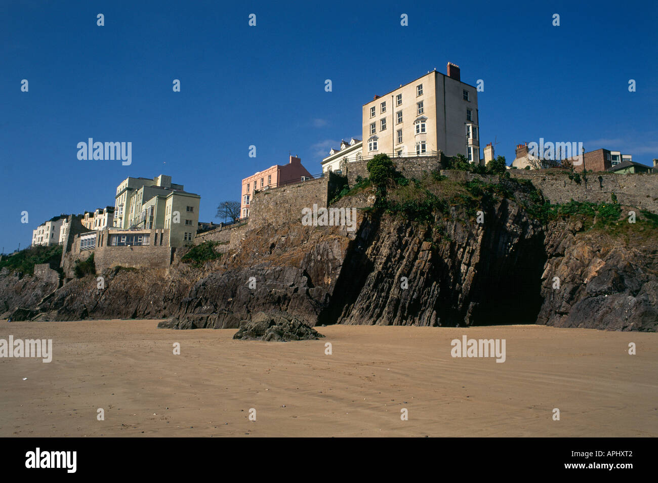 The houses and hotels along the seafront on the south beach in Tenby Pembrokeshire Coast National Park Stock Photo