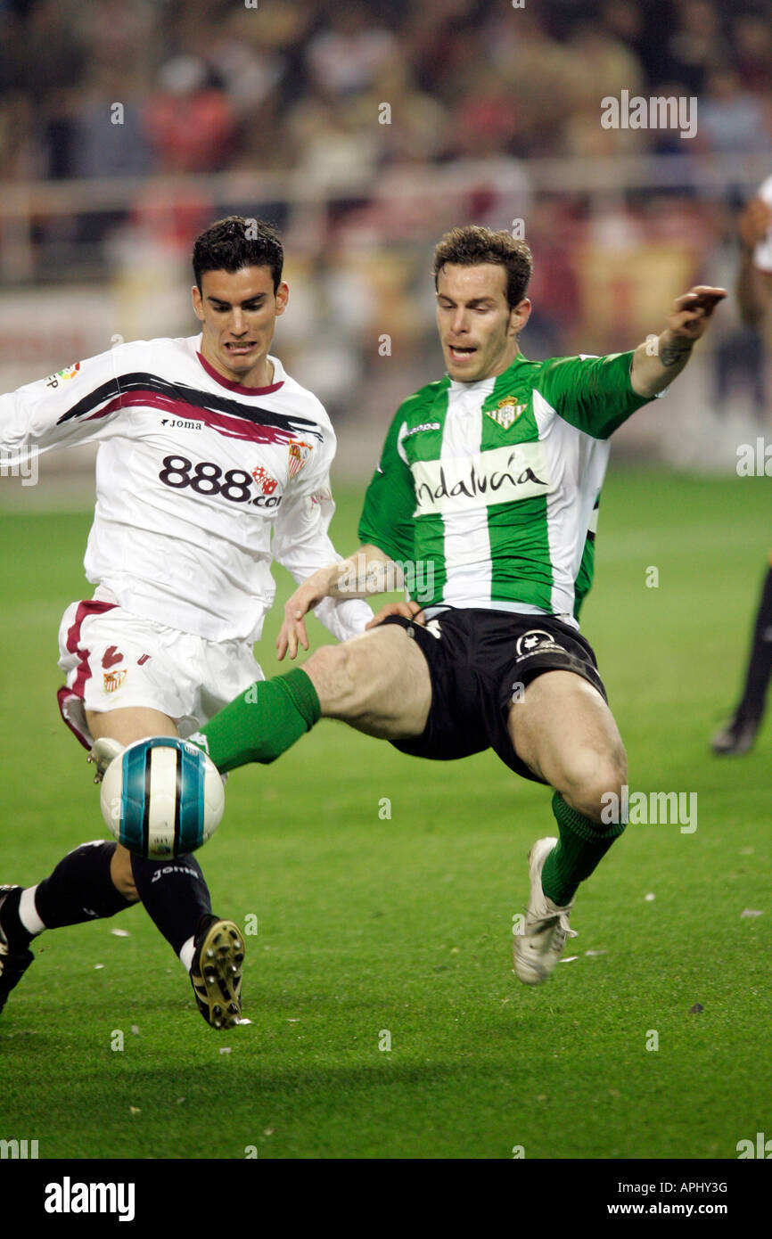 Fernando Vega (Betis) and Alejandro Alfaro (Sevilla) fighting for the ball. Stock Photo