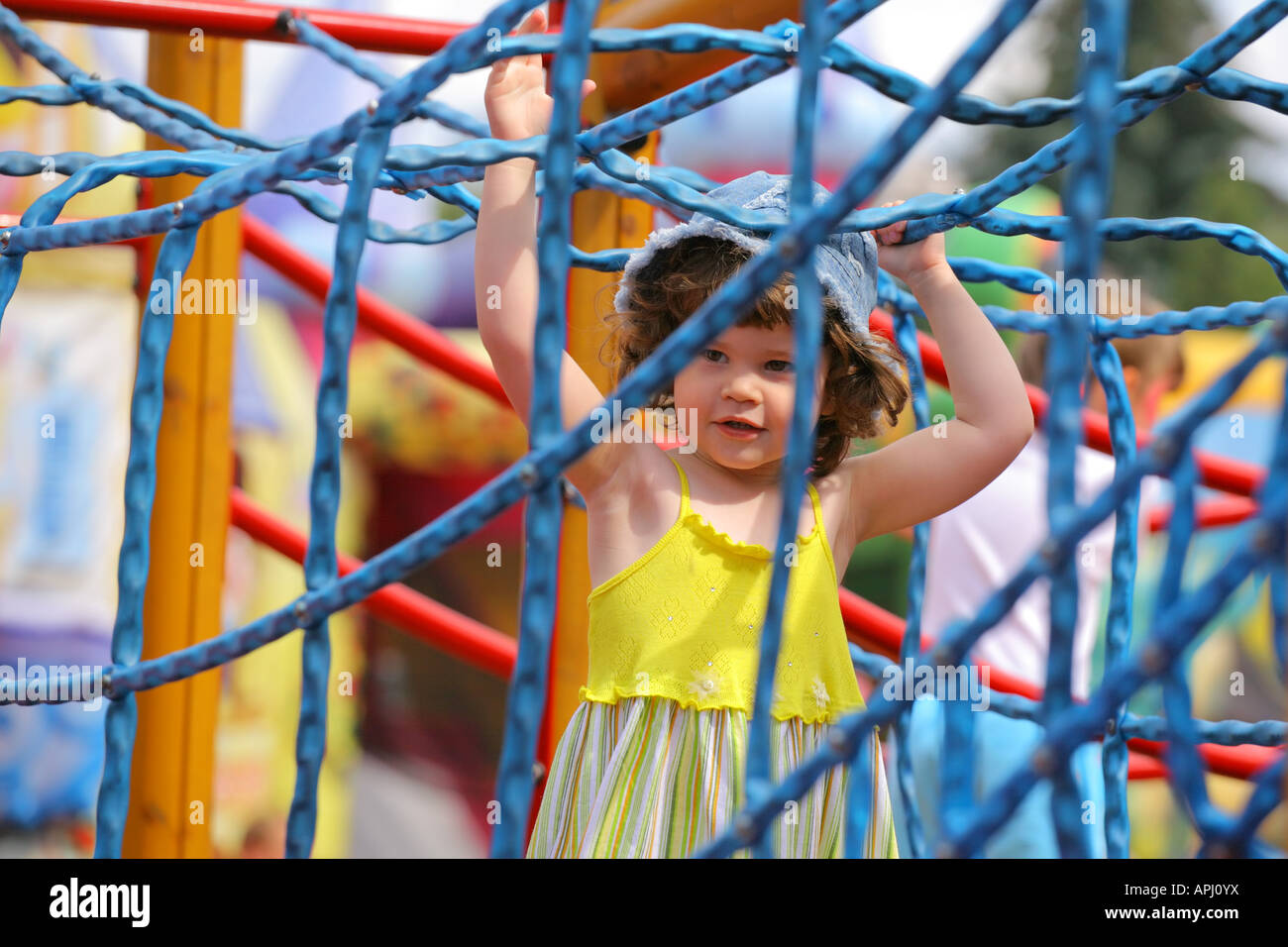 Little girl at the playground Stock Photo - Alamy