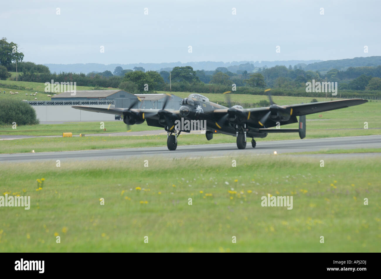 Lancaster bomber landing at Exeter Airport Uk England Stock Photo Alamy