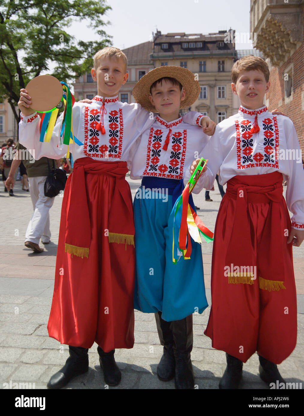 Three boys in Ukrainian National Costume Krakow folk festival Poland