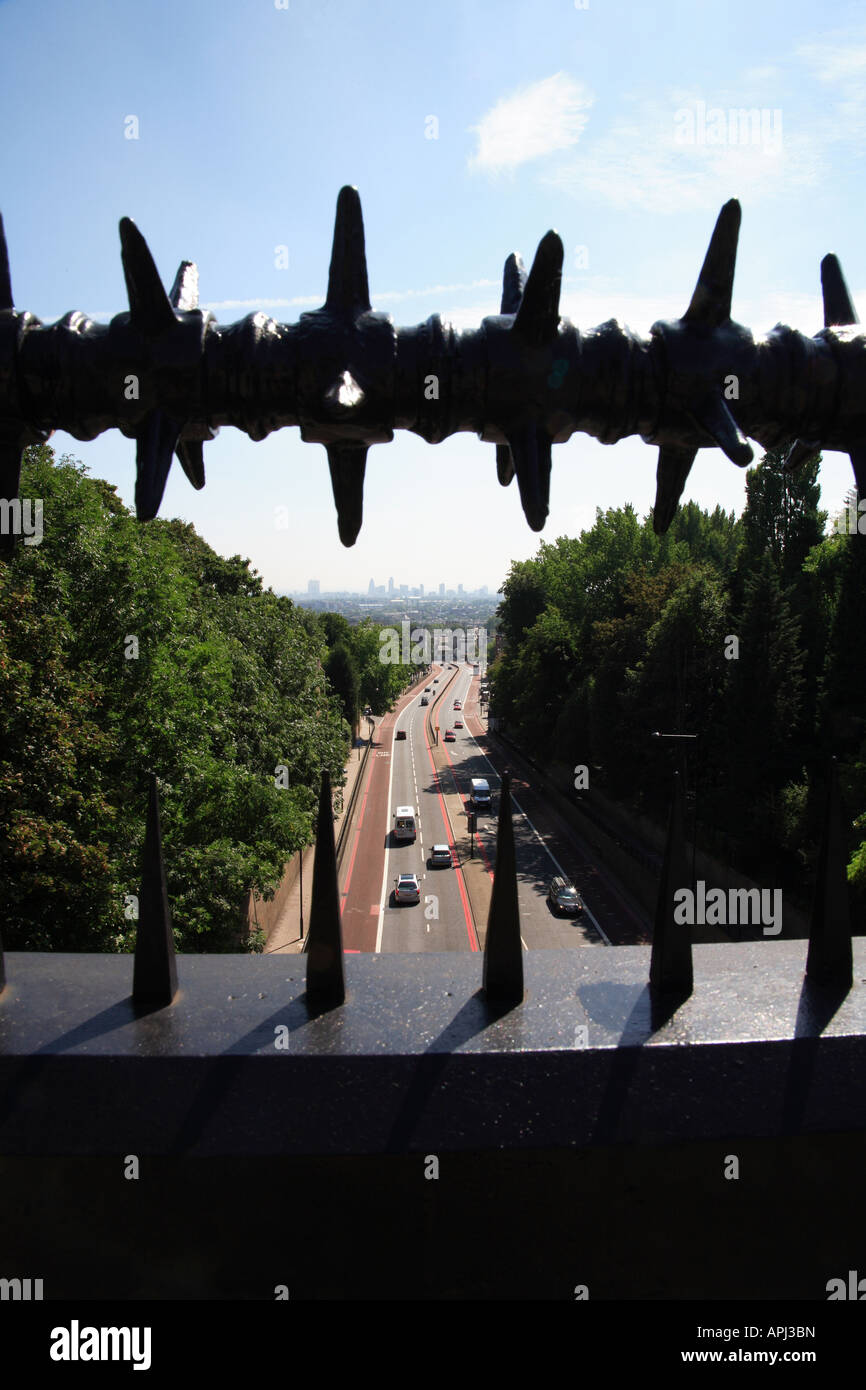 Anti suicide fence and view of the A1 from hornsey lane bridge, London, UK Stock Photo