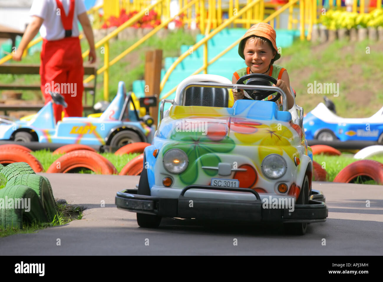 Boy driving a toy cars at Divo ostrov russia Stock Photo