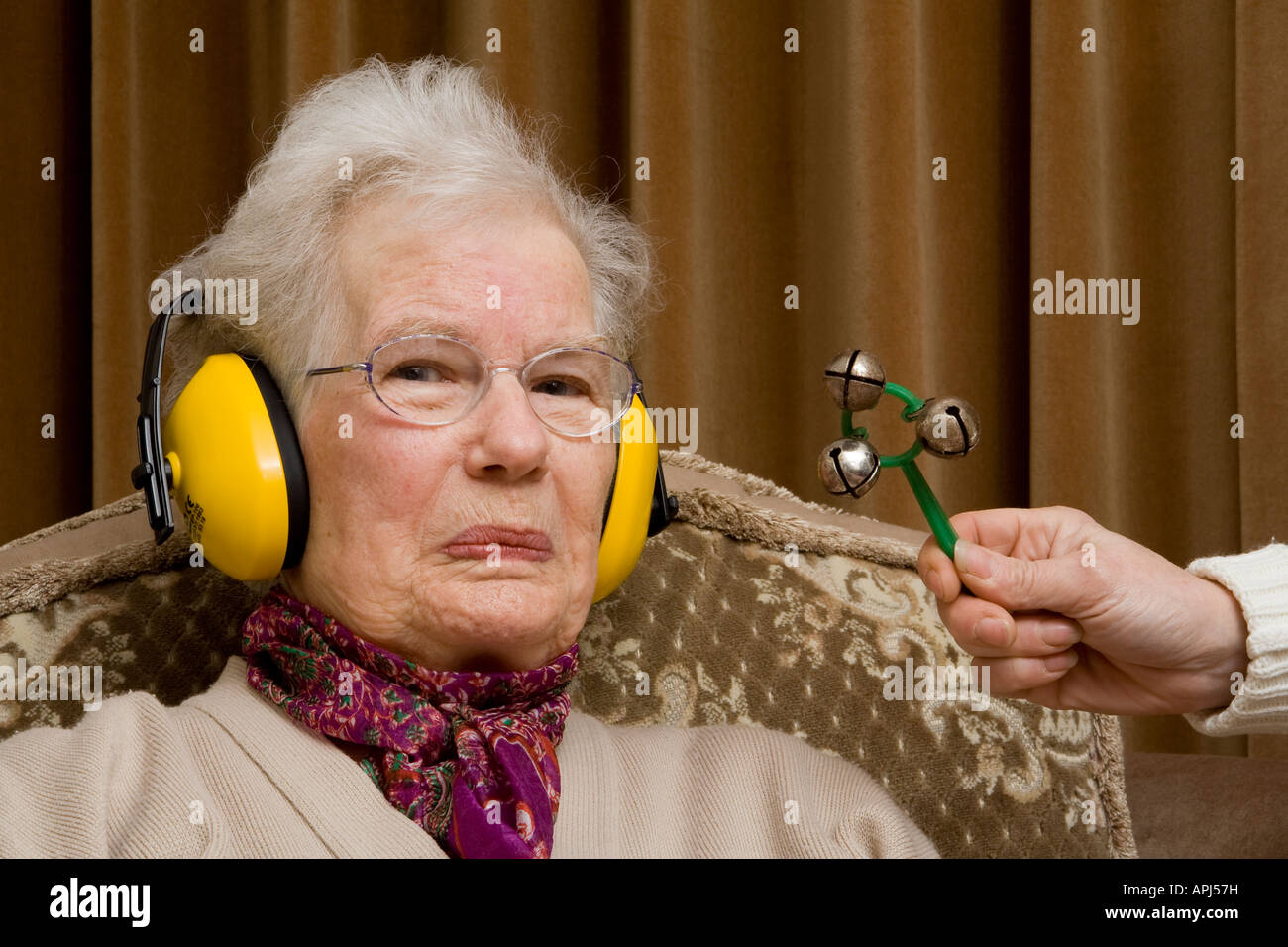 Lady wearing ear defenders hires stock photography and images Alamy