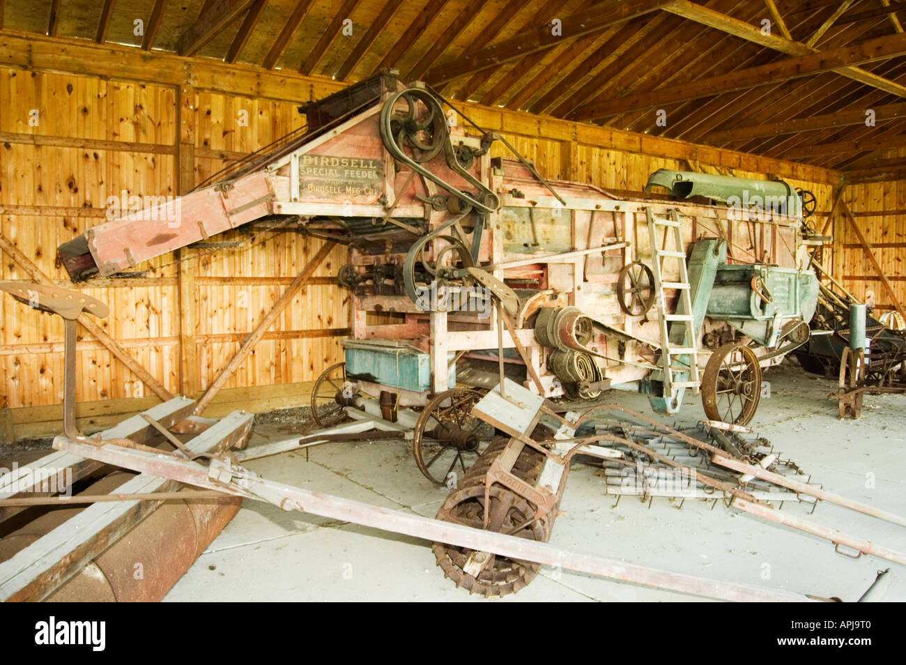 Thrashing machine with many belts and different drive equipment Stock