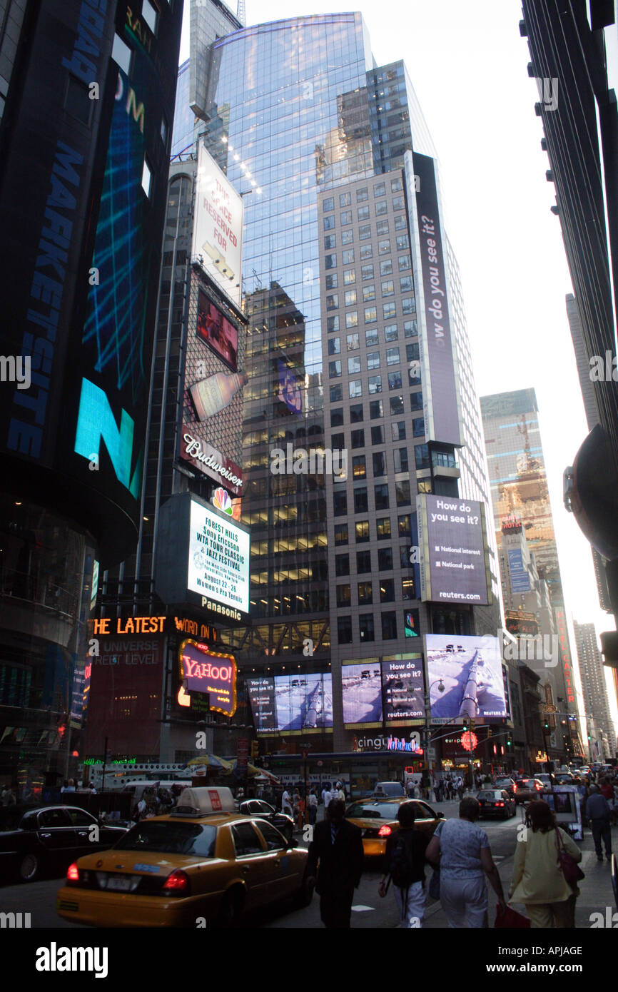 New York City street view with tall buildings and the rush of traffic ...