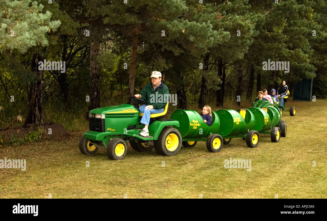 Kids Ride on Lawn Tractor with Trailers Stock Photo