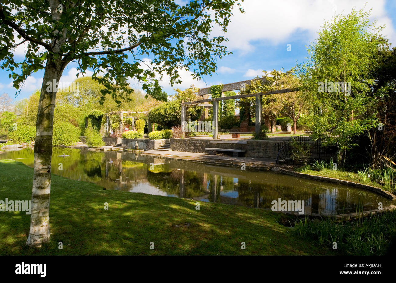 The pond and cafe terrace at Queen's Park, Swindon, Wiltshire Stock