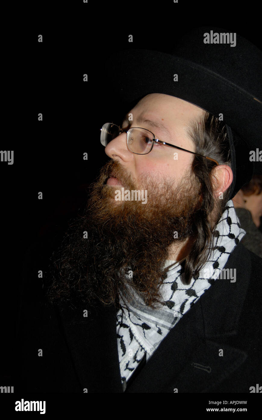 Hasidic man from Stamford Hill with keffiyeh scarf. Demonstration against occupation of Gaza Stock Photo