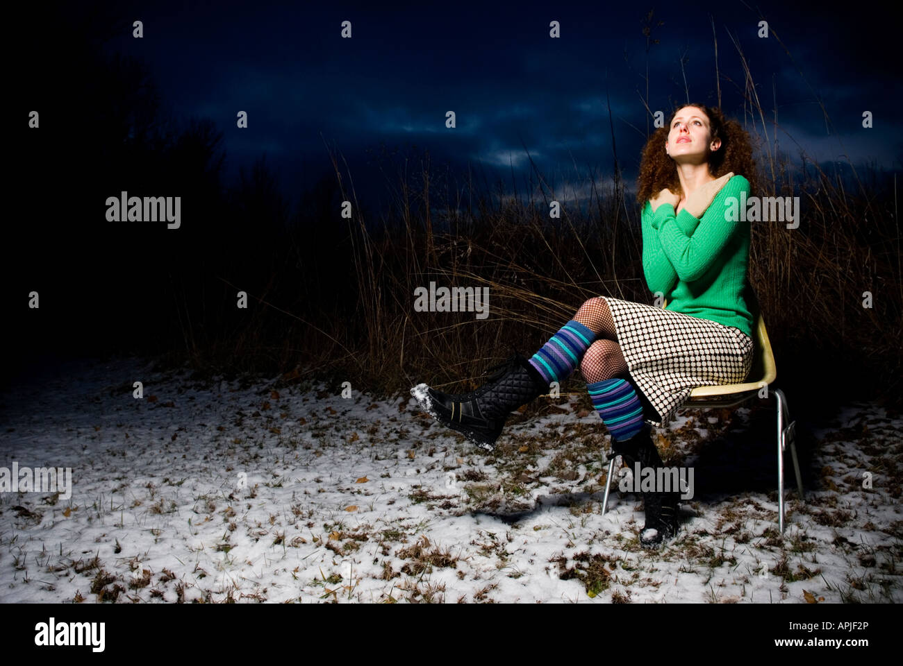 beautiful young fashion model at dusk, beautiful dusk sky Stock Photo