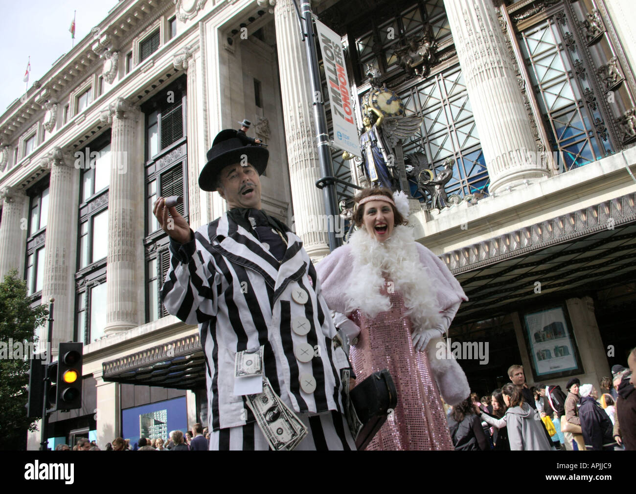 Performers on stilts in Oxford Street during the Dress to Impress event on Octoder 2005 Stock Photo