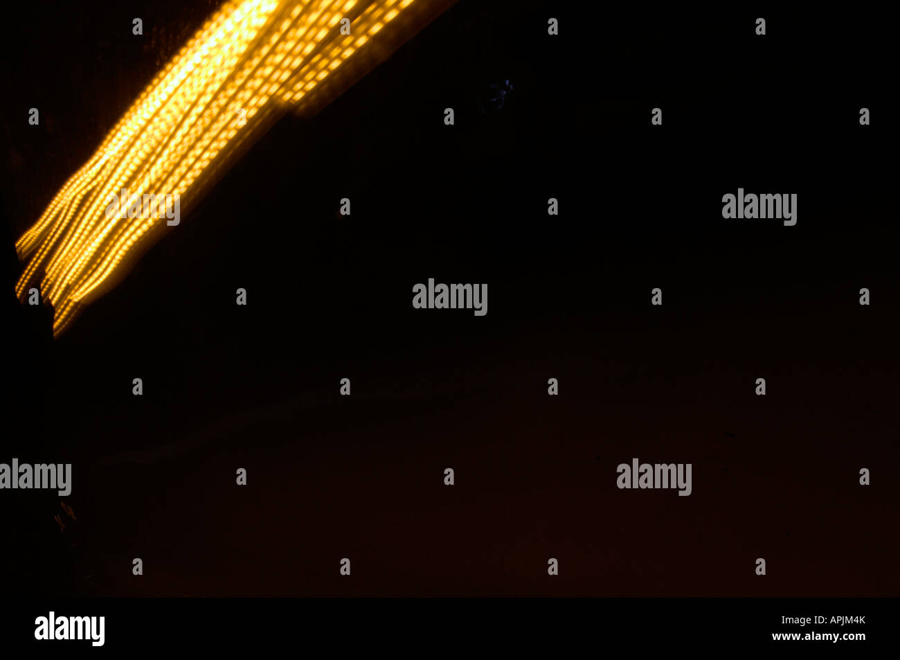 black background yellow light trails abstract art Stock Photo Alamy