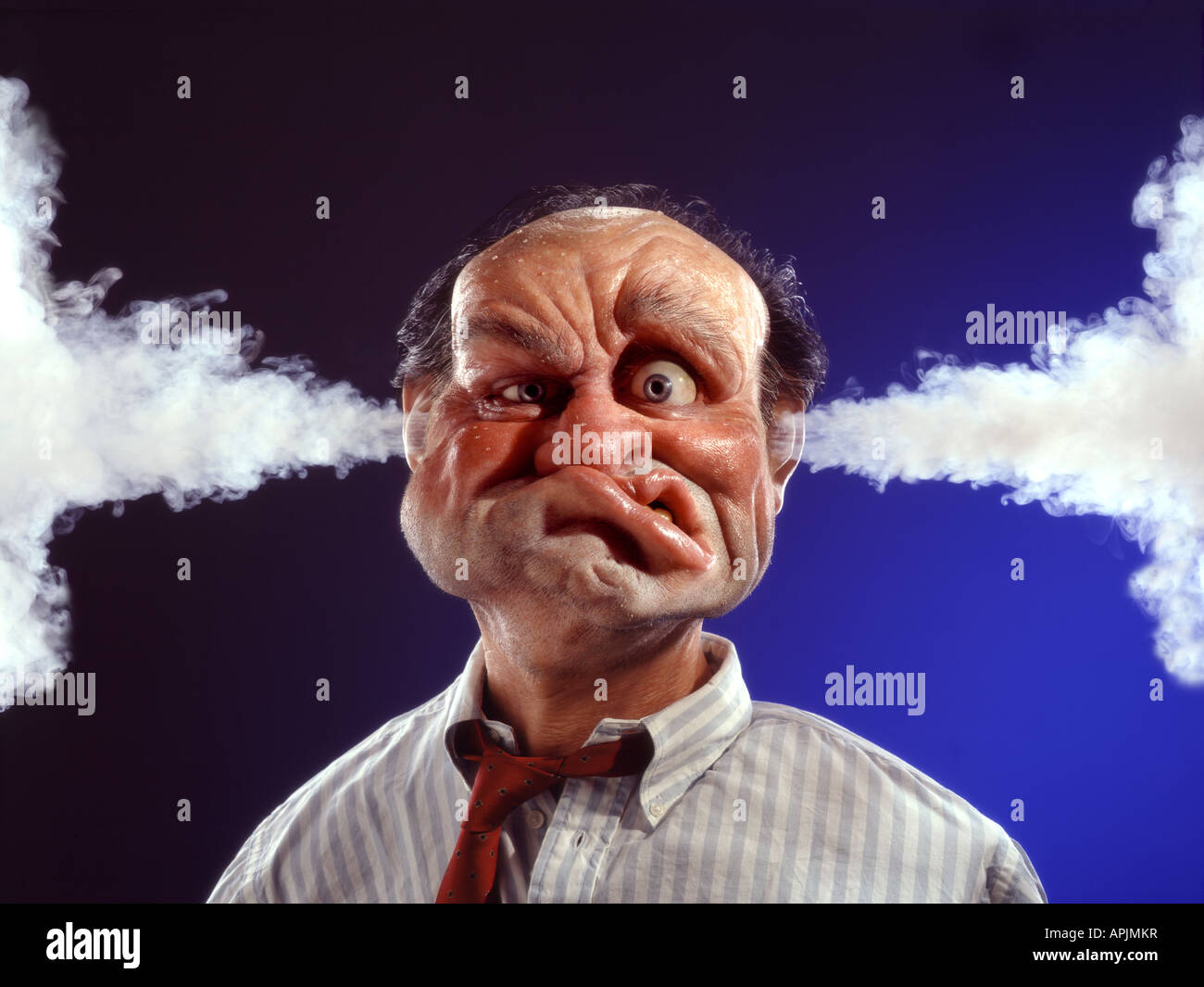Character Ugly Gurning Man with steam coming from ears. Stock Photo