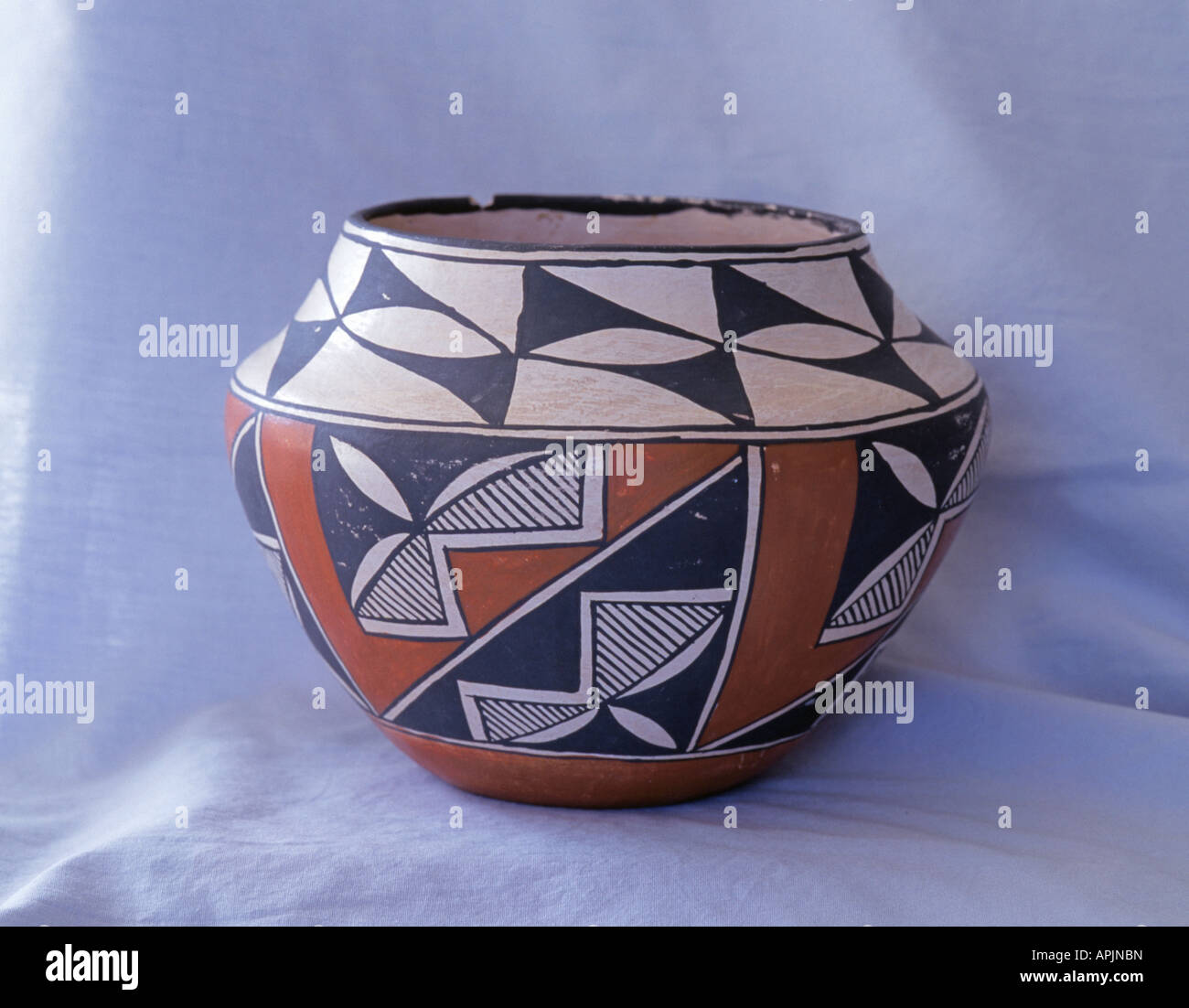An antique Acoma Indian ceramic pot or bowl from the Acoma Indian Pueblo sky city in central New Mexico, made by Nellie Chino. Stock Photo