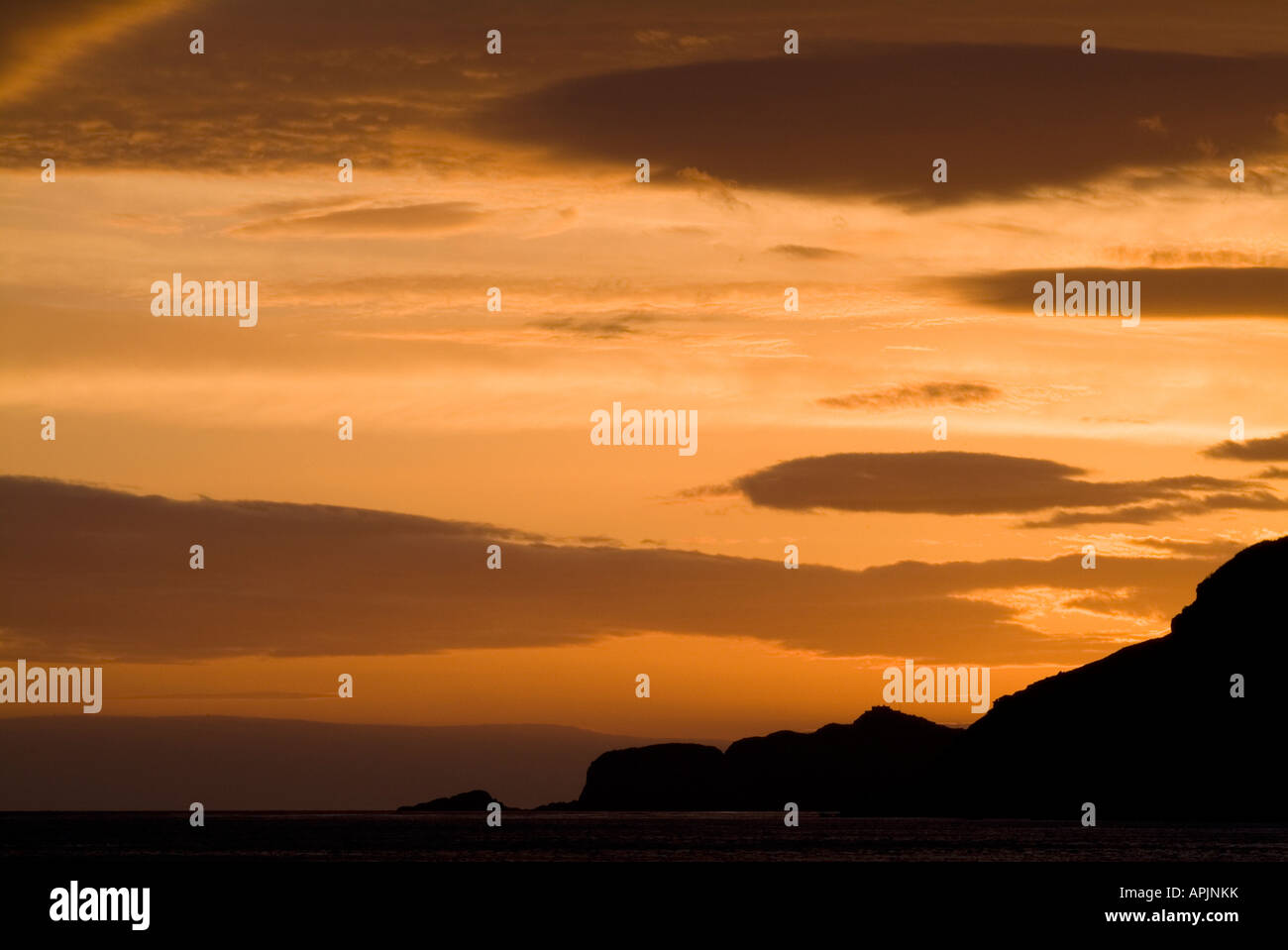 Landscape image of Torr Head at sunrise from Murlough Bay County Antrim Northern Ireland Stock Photo