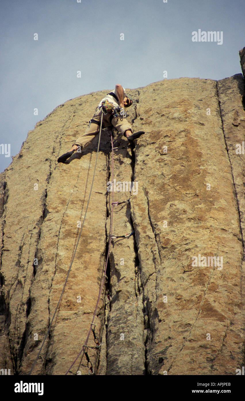 Idaho City of Rocks male climber nears the top of a rock face Stock Photo